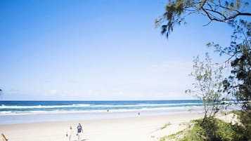 On the beach, sun-loungers, beach towels