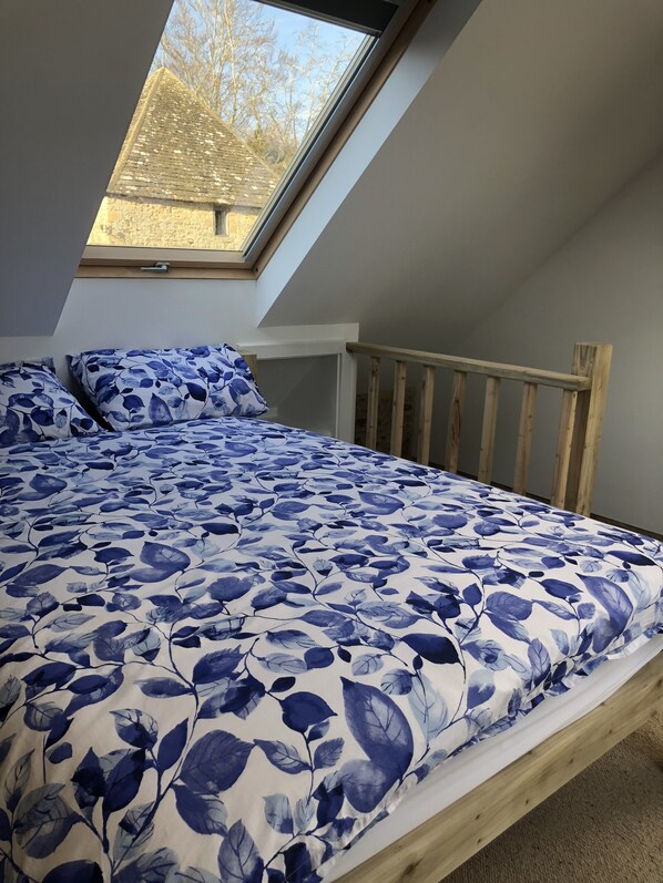 1 bedroom, desk, iron/ironing board, travel crib