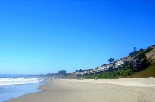 Big and Bright,  Steps to Sand, Ocean Views, and Sleeps 8+