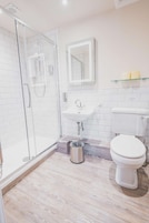 Shower, free toiletries, hair dryer, towels