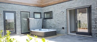 Idyllic property with private hot tub, designed to offer every home comfort, with a contemporary fee