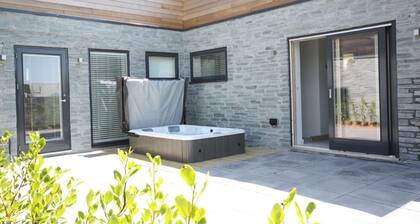 Idyllic property with private hot tub, designed to offer every home comfort, with a contemporary fee