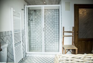 Shower, towels, toilet paper