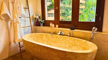 Combined shower/tub, hair dryer, towels, soap