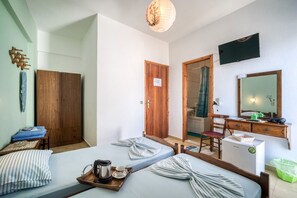 1 habitación, tabla de planchar con plancha, internet y ropa de cama 