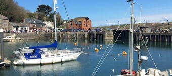 Lovely sunny bungalow near Rock, large secure garden, EV Charger on driveway