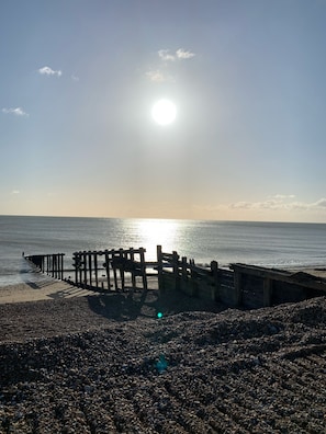 On the beach, sun-loungers - LUXURY SEAFRONT BEACH APARTMENT <br> (Eastbourne east sussex)