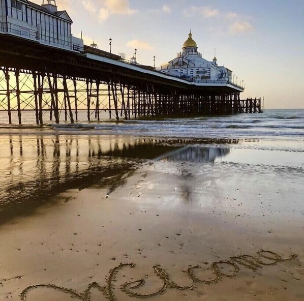 On the beach, sun-loungers