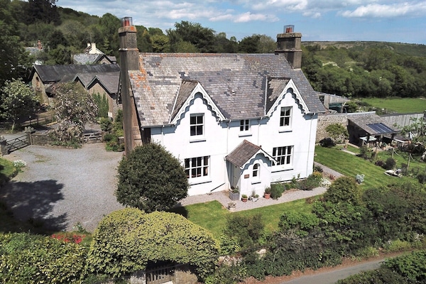 Town Barton, Manaton. Guest car park to the left, walled garden to the right.