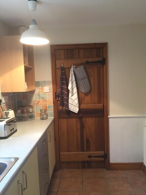 Fridge, coffee/tea maker, cookware/dishes/utensils, freezer