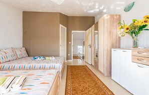 2 quartos, berço de viagem, Wi-Fi de cortesia, roupa de cama