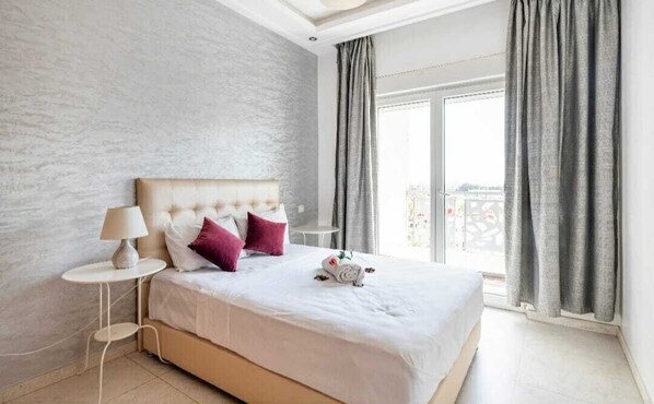 Apartment, 2 Bedrooms | 2 bedrooms, down comforters, desk, blackout drapes