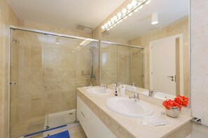 Bathtub, hair dryer, towels