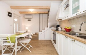 Fridge, stovetop, coffee/tea maker