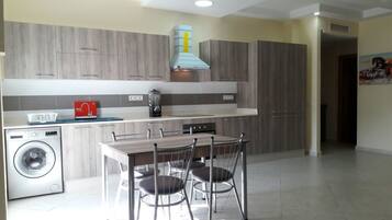 Apartment, 3 Bedrooms | Private kitchen | Full-sized fridge, microwave, oven, electric kettle