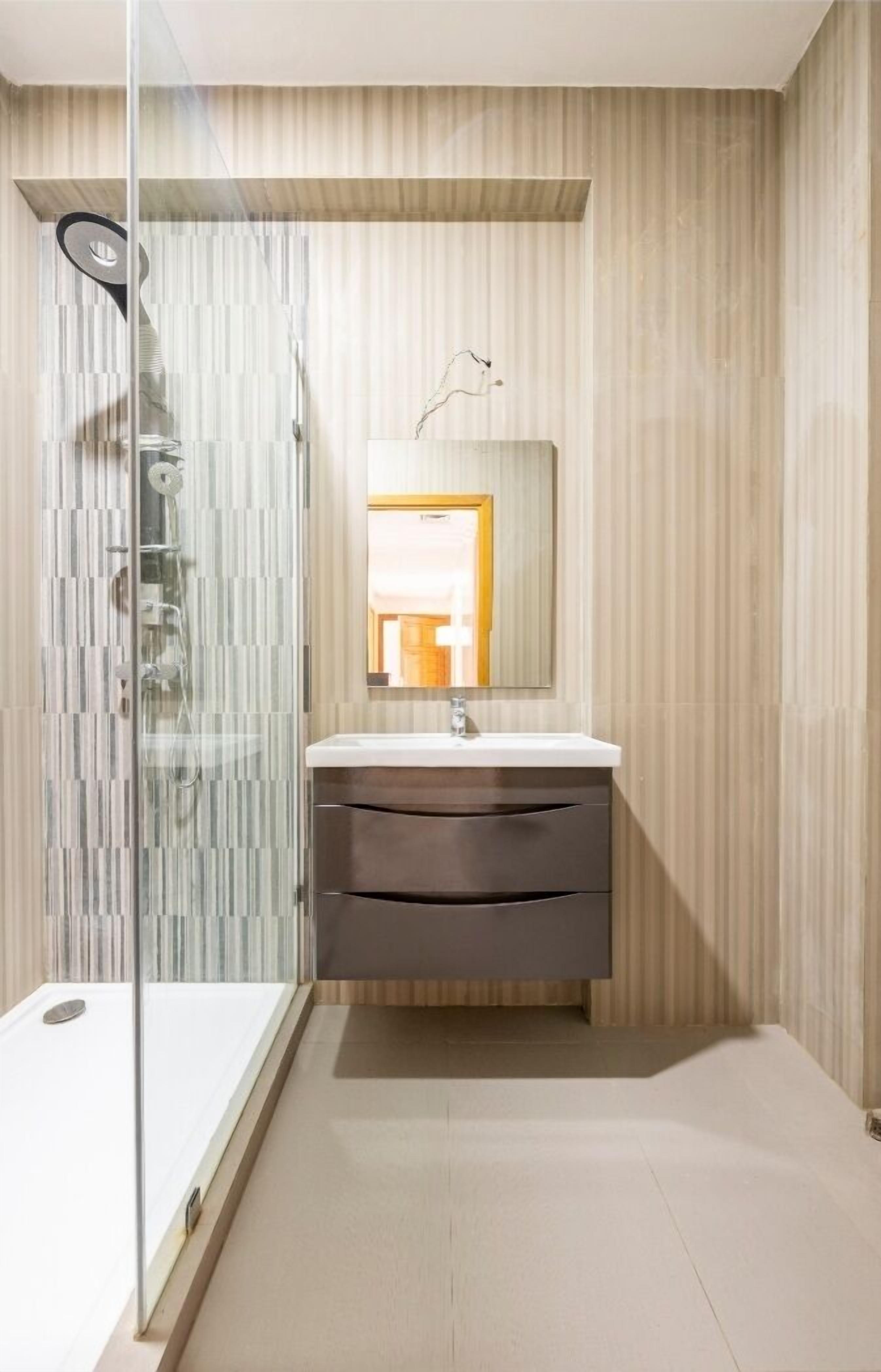 Separate bathtub and shower, deep-soaking bathtub, bathrobes, slippers