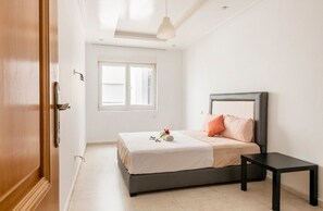 Appartement Confort, 3 chambres | 2 chambres, couette en duvet d'oie, rideaux occultants