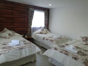 Standard Triple Room, 3 Twin Beds, Private Bathroom | Free WiFi, bed sheets - JC Hotel (Natales)