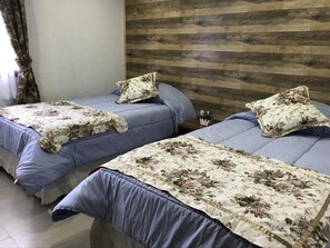 Standard Room, 2 Twin Beds, Private Bathroom | Free WiFi, bed sheets - JC Hotel (Natales)