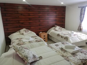 Standard Triple Room, 3 Twin Beds, Private Bathroom | Free WiFi, bed sheets - JC Hotel (Natales)