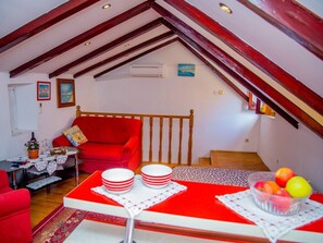 Loft | Área de estar | TV de tela plana