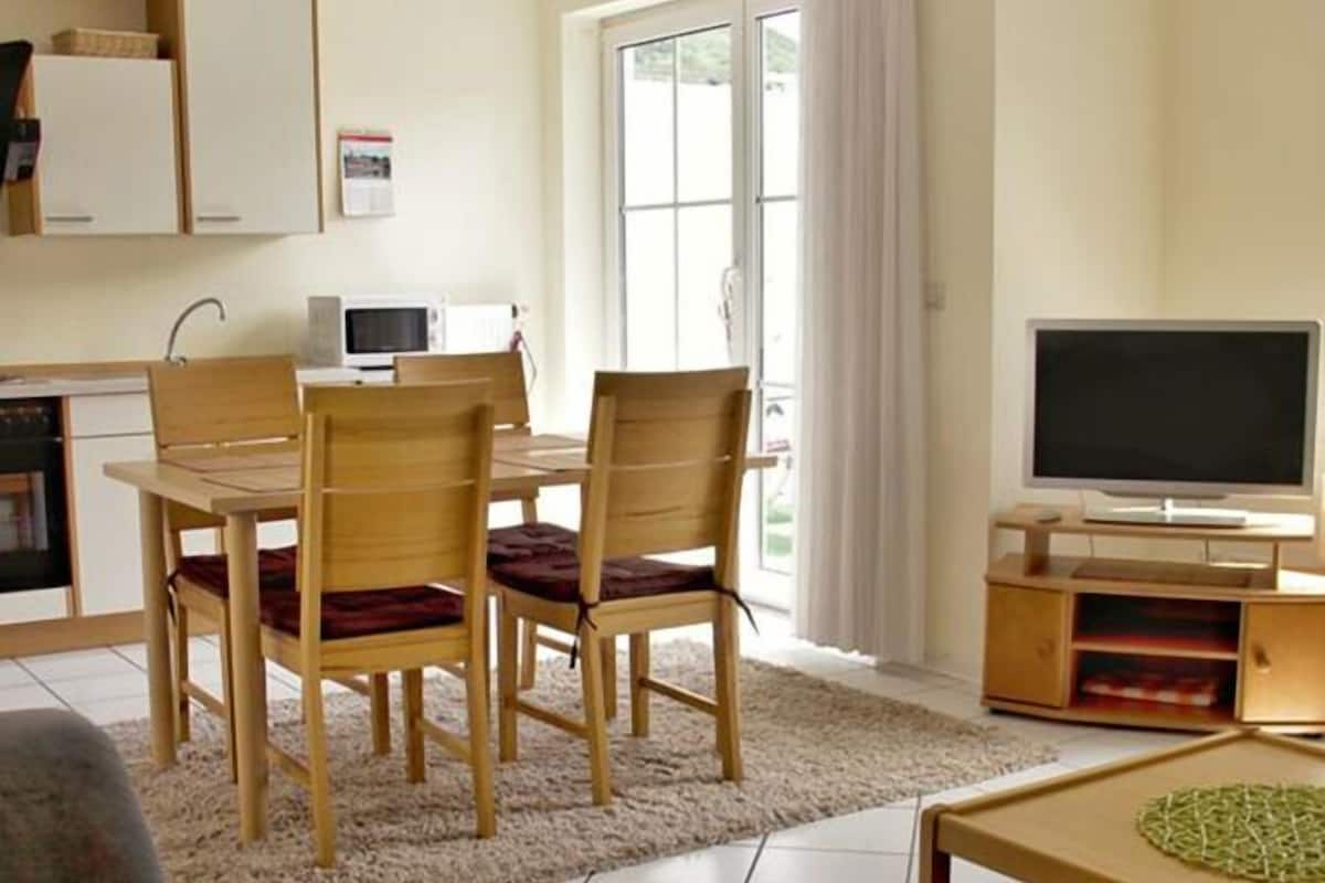 Comfort appartement | Woonruimte | Een flatscreentelevisie