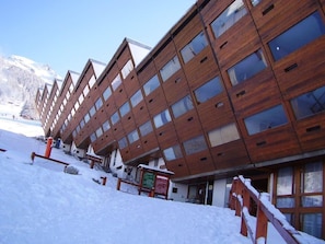 Experience the contemporary design of this mountain hotel, featuring large windows and stunning views of the surrounding landscape.
