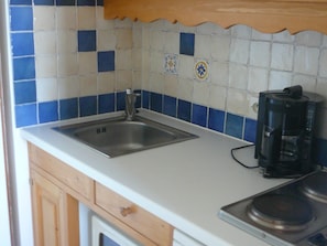 Fridge, microwave, coffee/tea maker, toaster