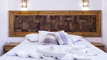 1 chambre, minibar, fer et planche à repasser, draps fournis