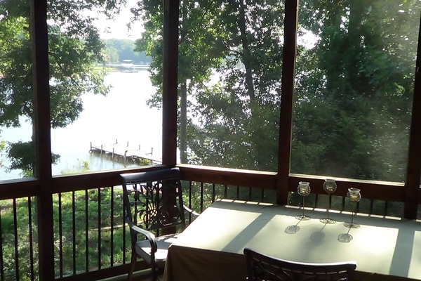 Screened in porch overlooking lake