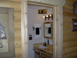 Shower, hair dryer, towels, toilet paper