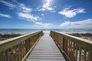 Walk along the boardwalk to the serene ocean view.