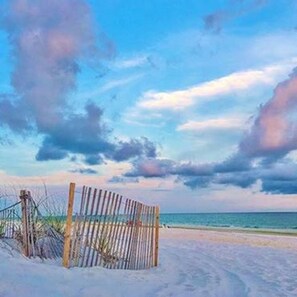 On the beach, sun-loungers