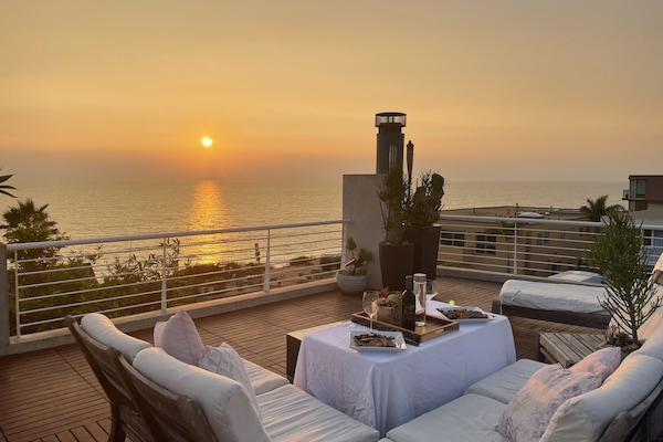 Rooftop sunsets with optional dinner setup