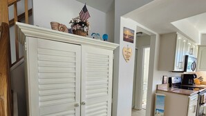 A kitchen with a microwave, stove, and cabinets. - 5 Star AMAZING Perfect Beach Retreat just for you.  Cozy, Clean, Comfortable (Brigantine)