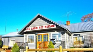 A log cabin restaurant with a prominent sign, a wooden fence, and a date stamp of 03/05/2012. - Cabin # 2, Kentucky Lake, Bass Fishing, Camden, Tn, (Nashville 1, Memphis 1.5) (Camden)