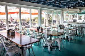 Dining - Beachfront Condo 227 with brand new pool Luxury 2 BR at Beachside Colony (Tybee Island)