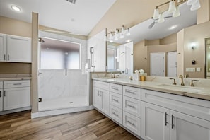 Combined shower/tub, hair dryer, towels, soap
