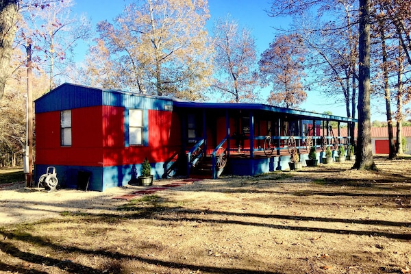 Front View Showing Porch & 2 Double Swings