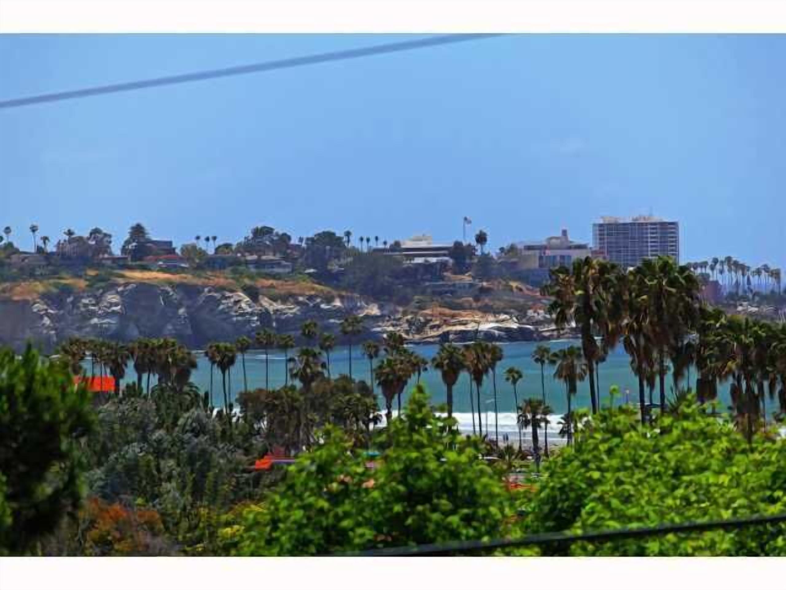 Ocean views, hot tub & pool, walk to beach, restaurants, and more!