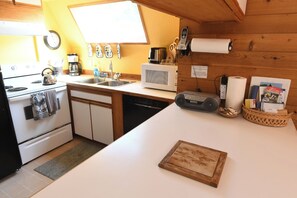 Fridge, microwave, dishwasher, coffee/tea maker