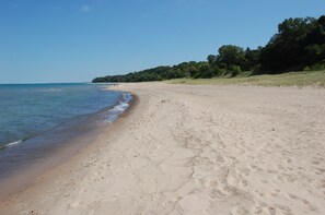 On the beach, sun-loungers, beach towels