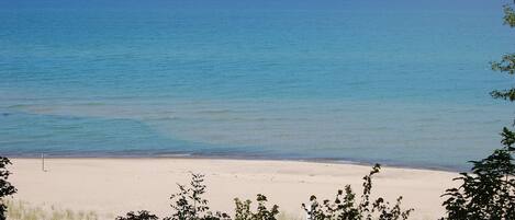 On the beach, sun loungers, beach towels