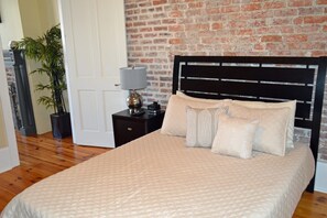 Guest Queen bedroom is interior to the condo - "Caroline" Julia Street Condo with Balcony (New Orleans)