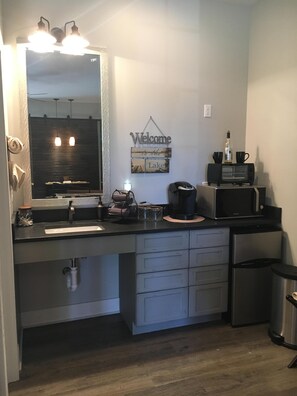 Fridge, microwave, coffee/tea maker, toaster