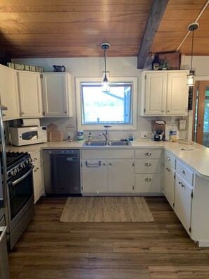 Newly added laminate vinyl flooring throughout most of the main level.  