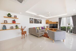 60-inch flat-screen TV with cable channels, TV