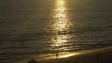 On the beach, sun loungers, beach towels