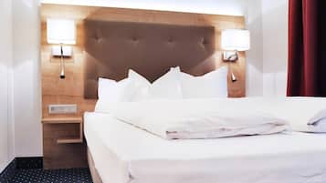 Ropa de cama de alta calidad y minibar