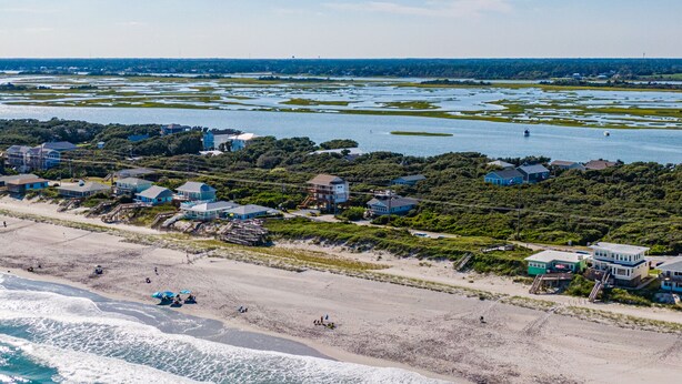 A coastal area with houses near the beach and water. - Callalily | Gorgeous Ocean Views in Topsail Beach! (Topsail Beach)